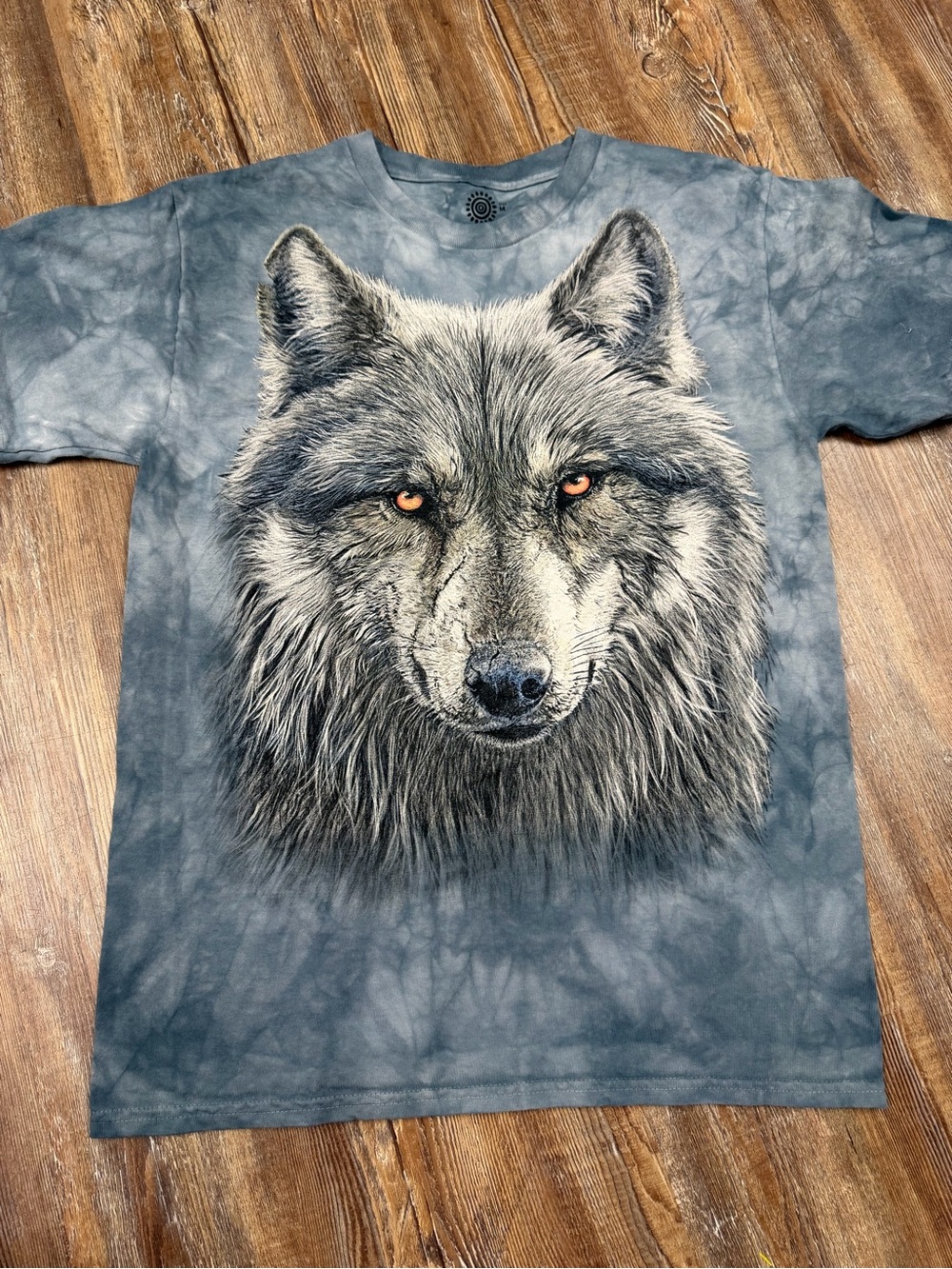 The Mountain Wolf Graphic Tee
Size: Medium
100% Cotton
Blue tie-dye with a wolf